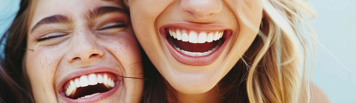 Two women in Wrexham with composite bonded teeth