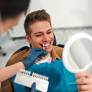 Man having composite bonding treatment explained at Wrexham dentist